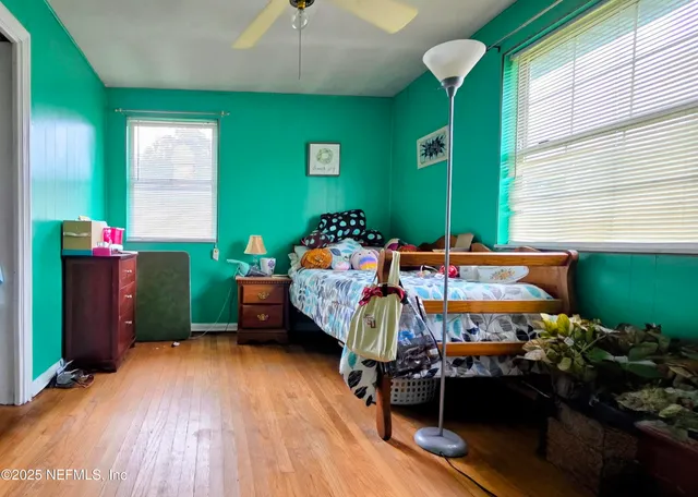 a room with furniture and wooden floor