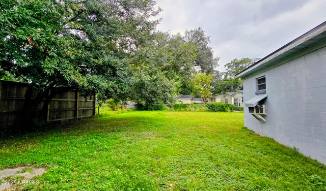 a view of a backyard with a garden