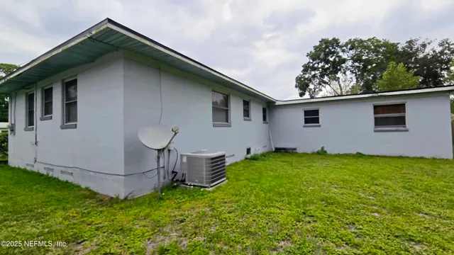 a house with garden in front of it