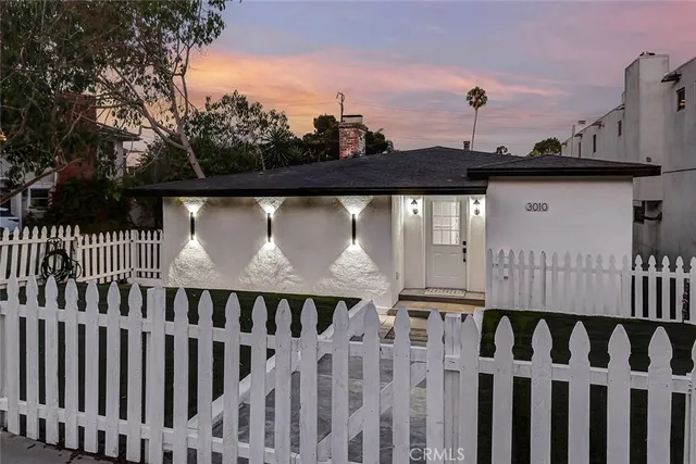 a view of a street from a roof deck
