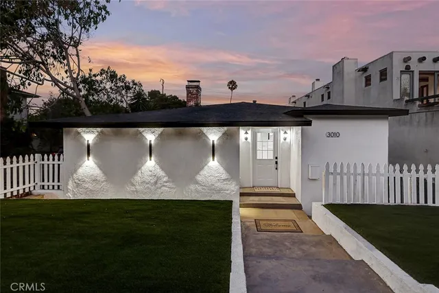a view of a back yard of the house