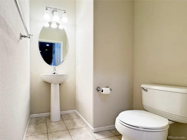 a view of an empty room with windows