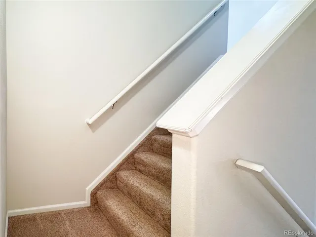 a view of a room that has a window