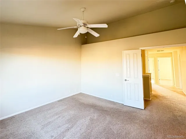 a bathroom with a toilet a sink and a mirror