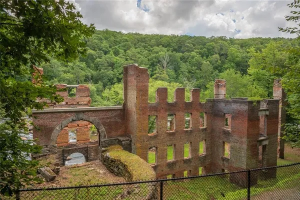 a view of balcony with furniture