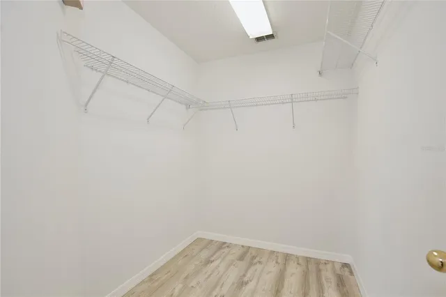 a view of a room with racks on the wall