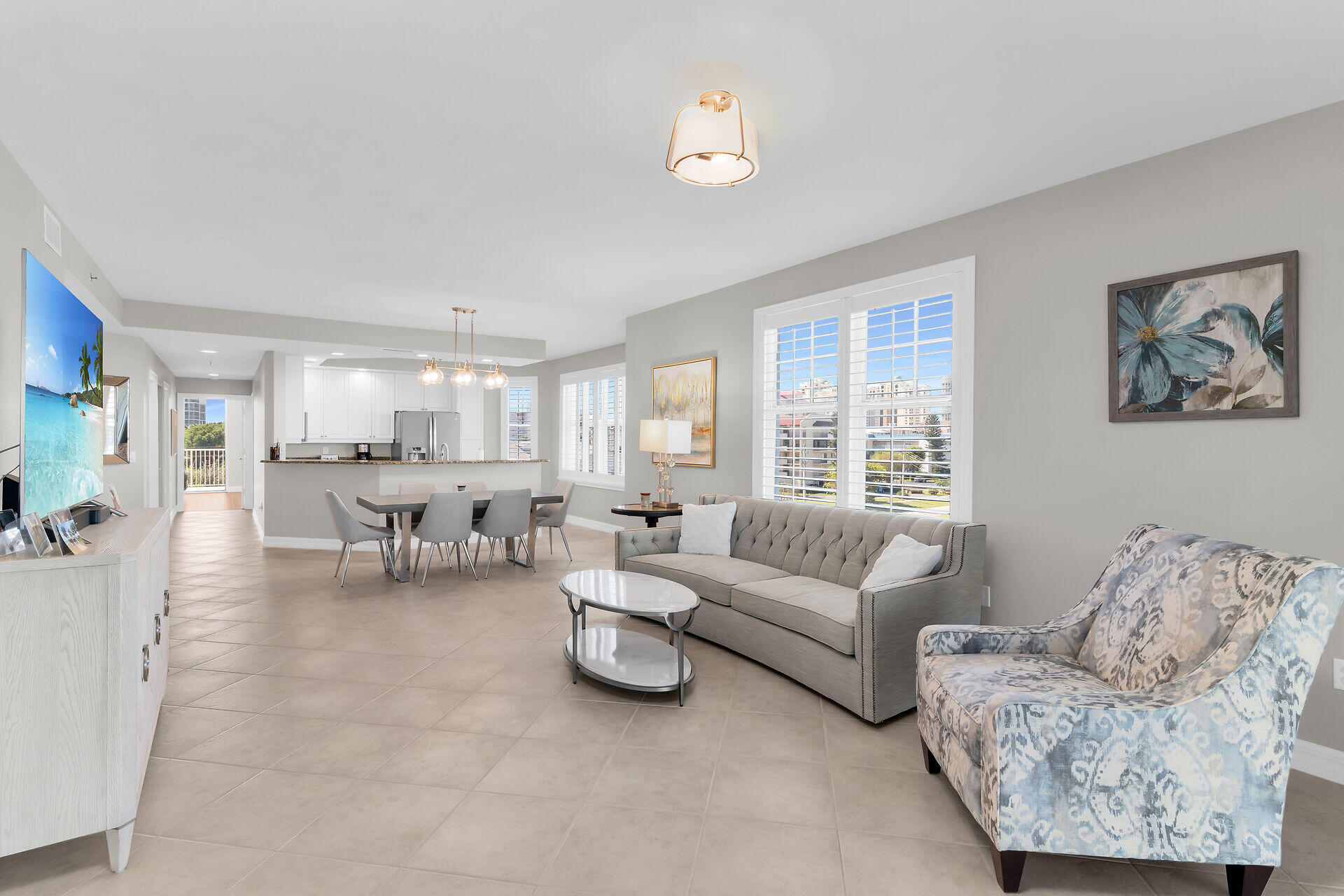 1111 Swallow Avenue, Unit 1401 Marco Island, FL 34145 - Photo 21 of 36 a living room with furniture and a large window