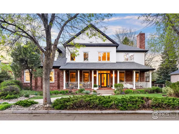 front view of a house with a garden