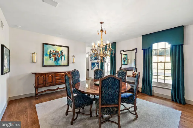 a bedroom with a bed and a night stand