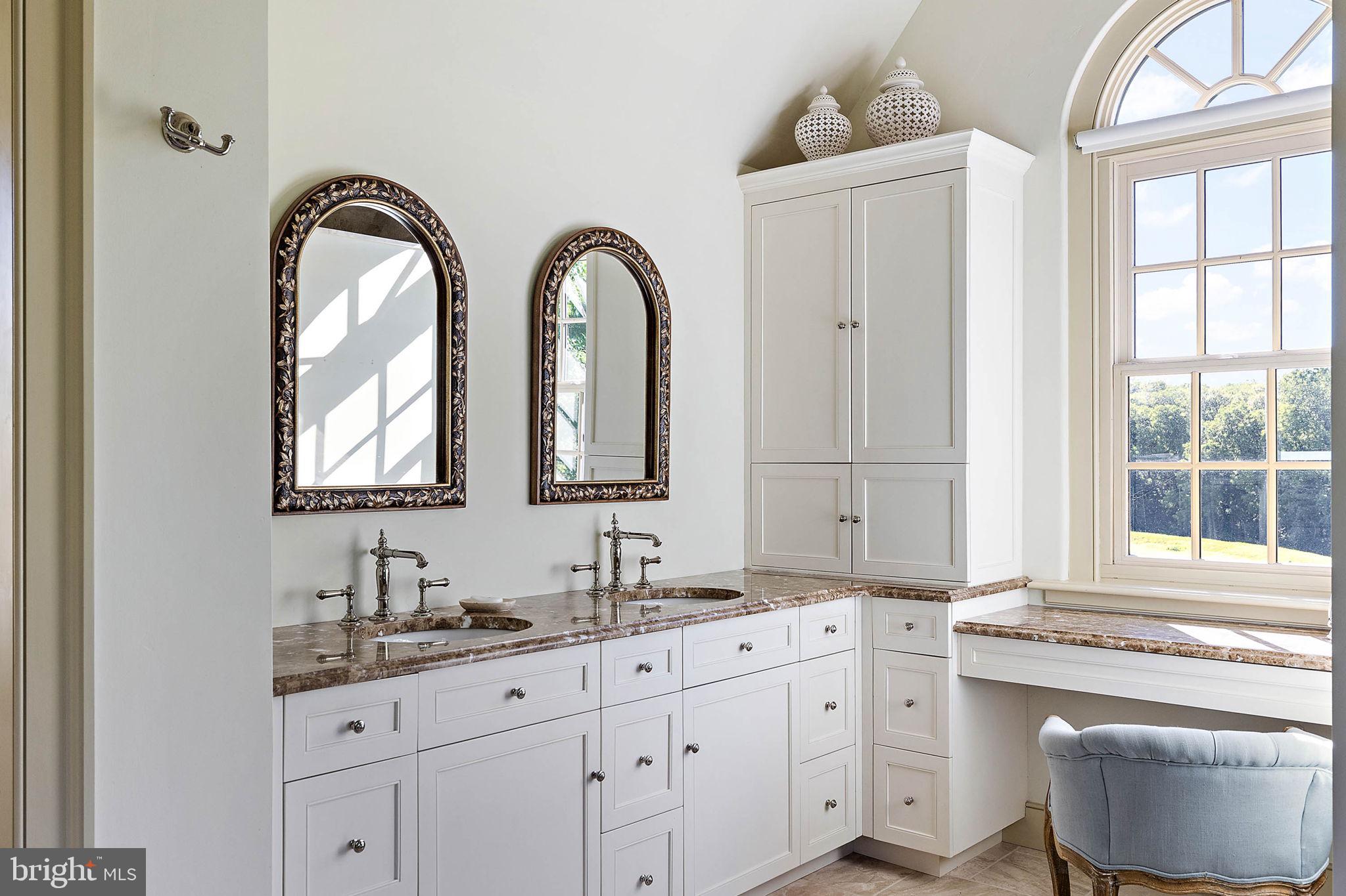 4635 Newark Road Cochranville, PA 19330 - Photo 32 of 113 a bathroom with a granite countertop sink a large mirror and a window