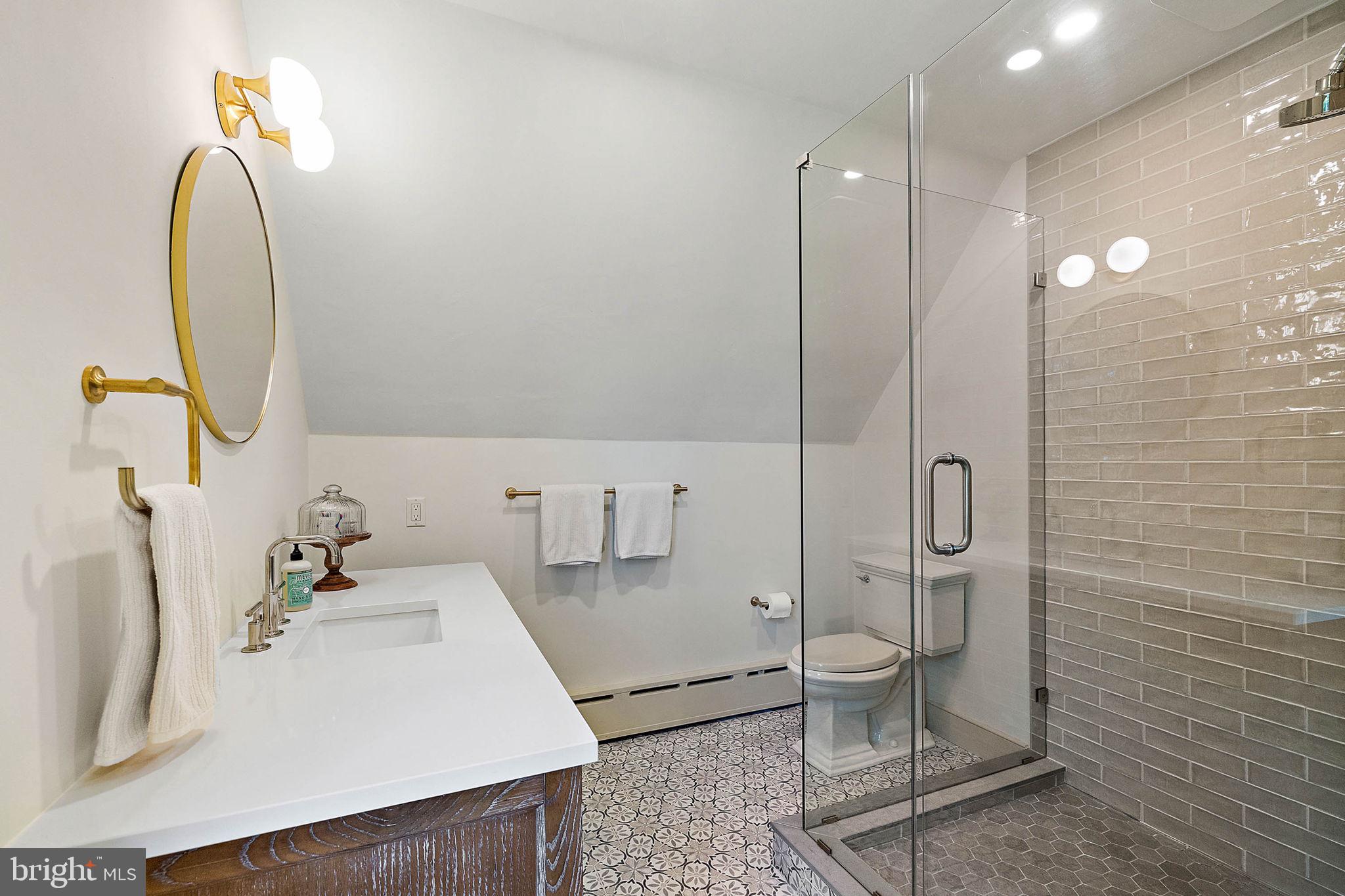 4635 Newark Road Cochranville, PA 19330 - Photo 38 of 113 a bathroom with a sink toilet and shower