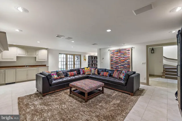 a view of a field with trees in the background