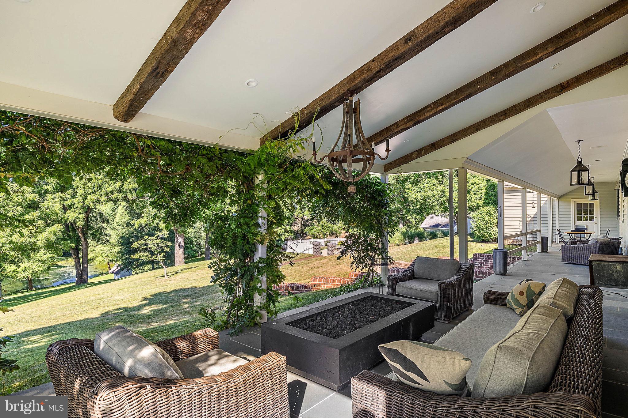 4635 Newark Road Cochranville, PA 19330 - Photo 45 of 113 a outdoor living space with furniture and garden view