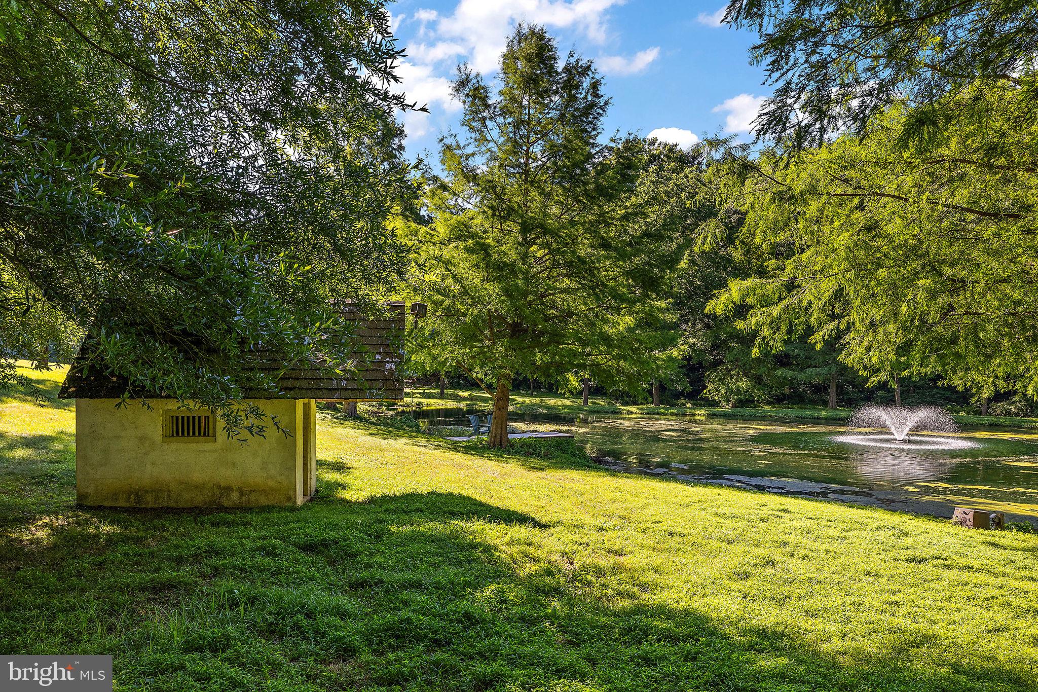 4635 Newark Road Cochranville, PA 19330 - Photo 51 of 113 a view of a swimming pool with an outdoor space and seating area