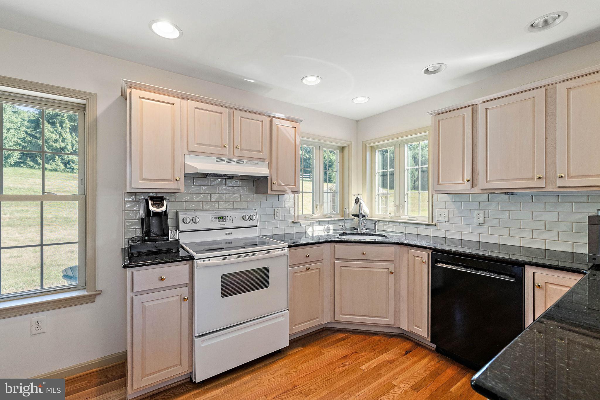 4635 Newark Road Cochranville, PA 19330 - Photo 64 of 113 a kitchen with appliances cabinets and a sink