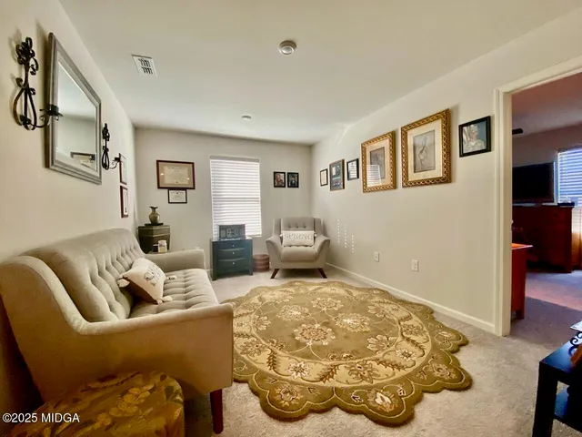 a living room with furniture and a couch