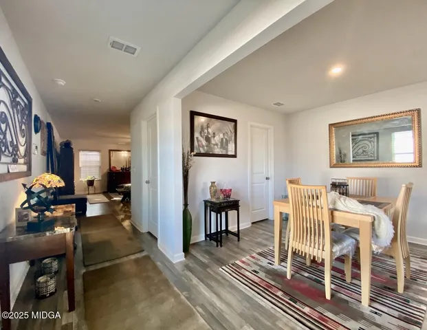 a living room with furniture and a table