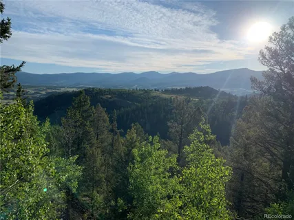 a view of lake with mountain