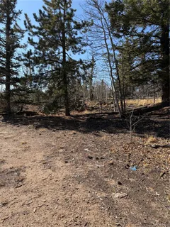 a view of outdoor space with wooden fence