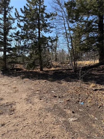 a view of outdoor space with wooden fence