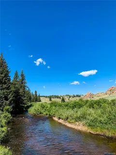 a view of a lake with a mountain