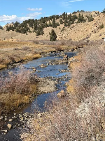 a view of ocean view with large trees
