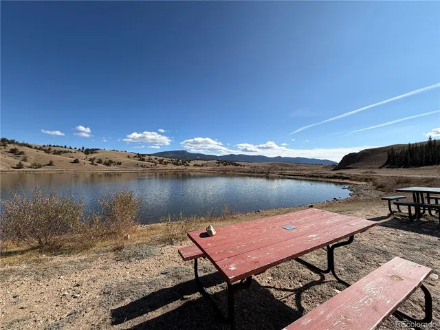a view of a lake with mountains in the background