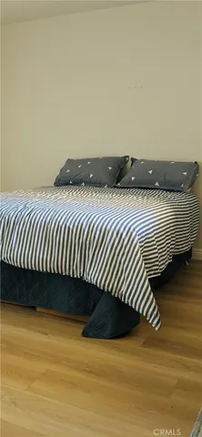 a bedroom with a bed