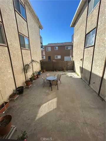 a front view of a house with parking space