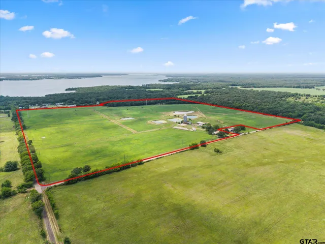 a view of a lake with a city