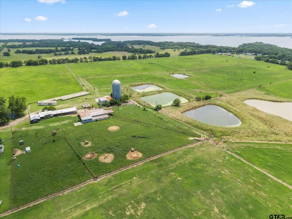 a view of a green field with clear sky