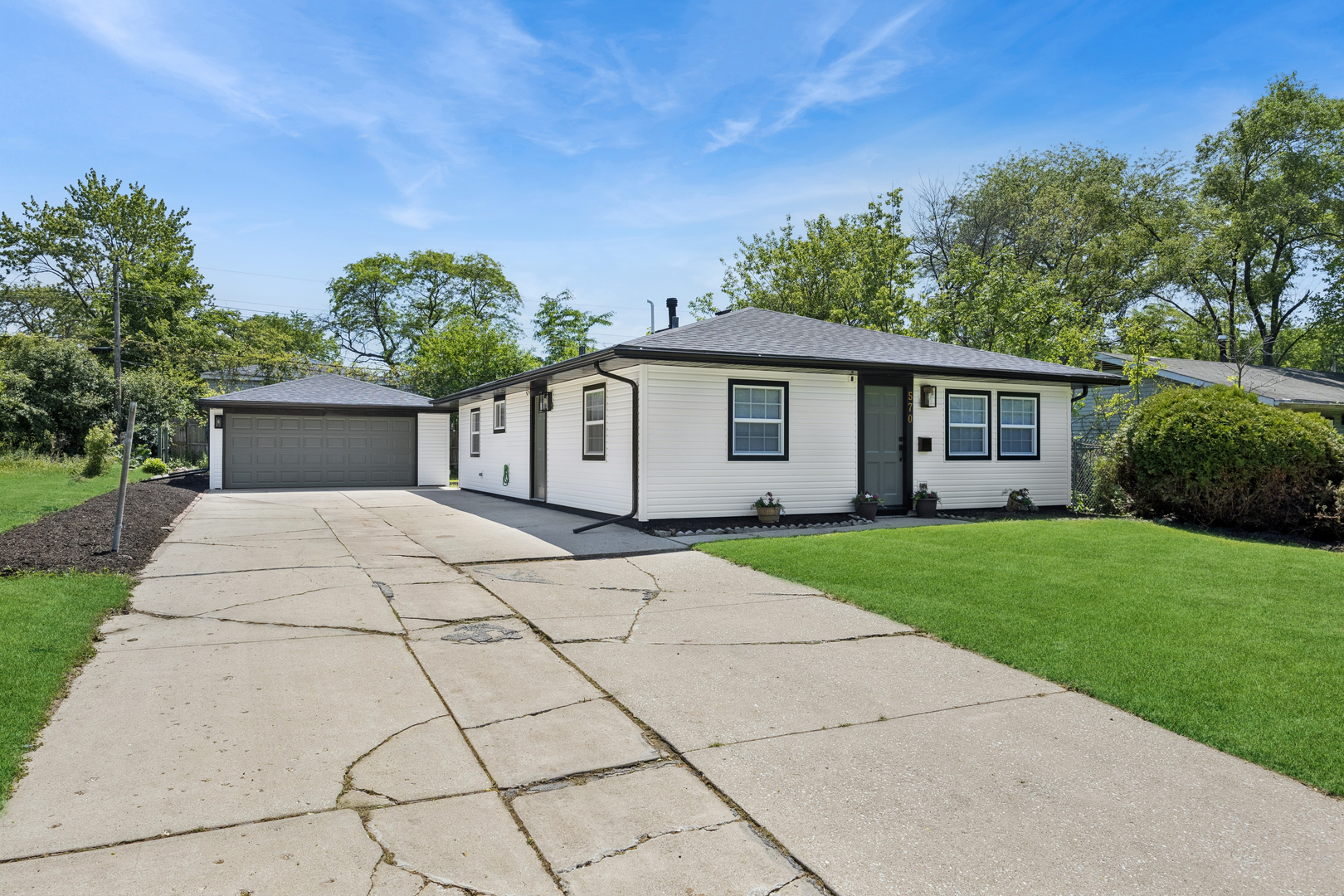 570 Andover Street Chicago Heights, IL 60411 - Photo 2 of 22 front view of a house with a yard