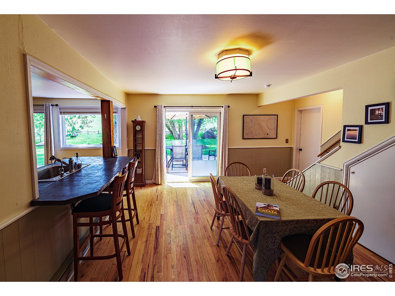 222 Boxer Ranch Road Livermore, CO 80536 - Photo 11 of 28 a dining room with furniture and window