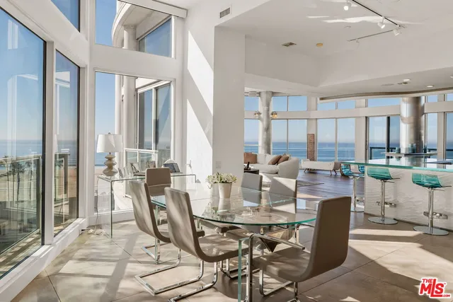 a bathroom with a shower sink and mirror