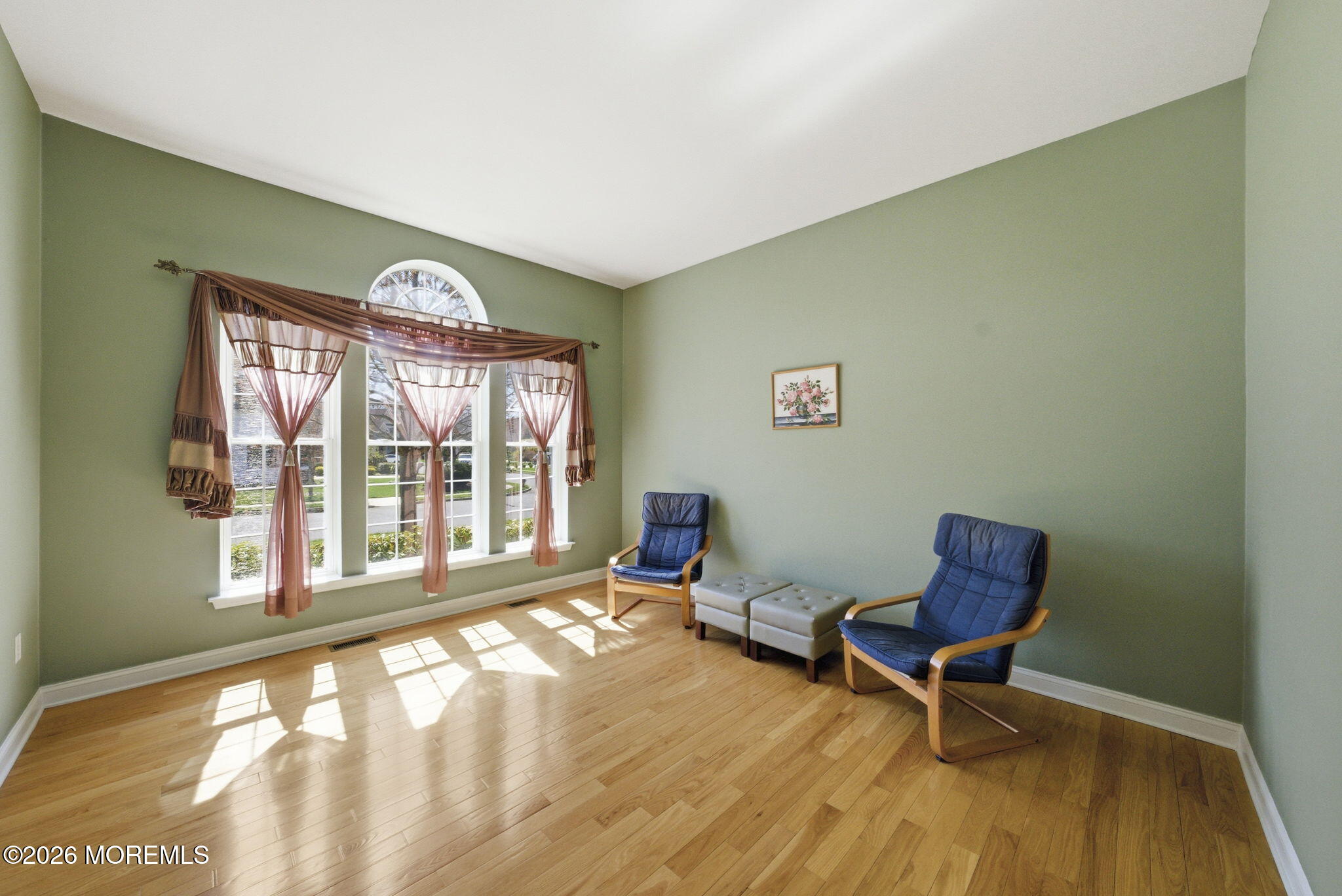 20 Royal Lane Howell, NJ 07731 - Photo 17 of 53 a view of an empty room with a window and wooden floor