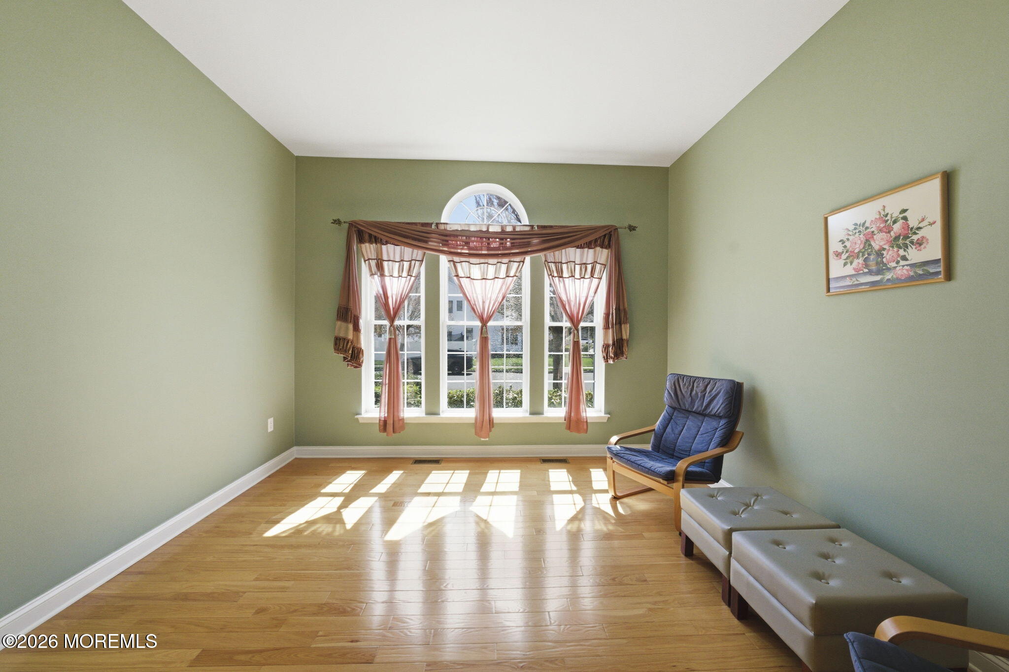 20 Royal Lane Howell, NJ 07731 - Photo 18 of 53 a view of a livingroom with lounge chair and a large window