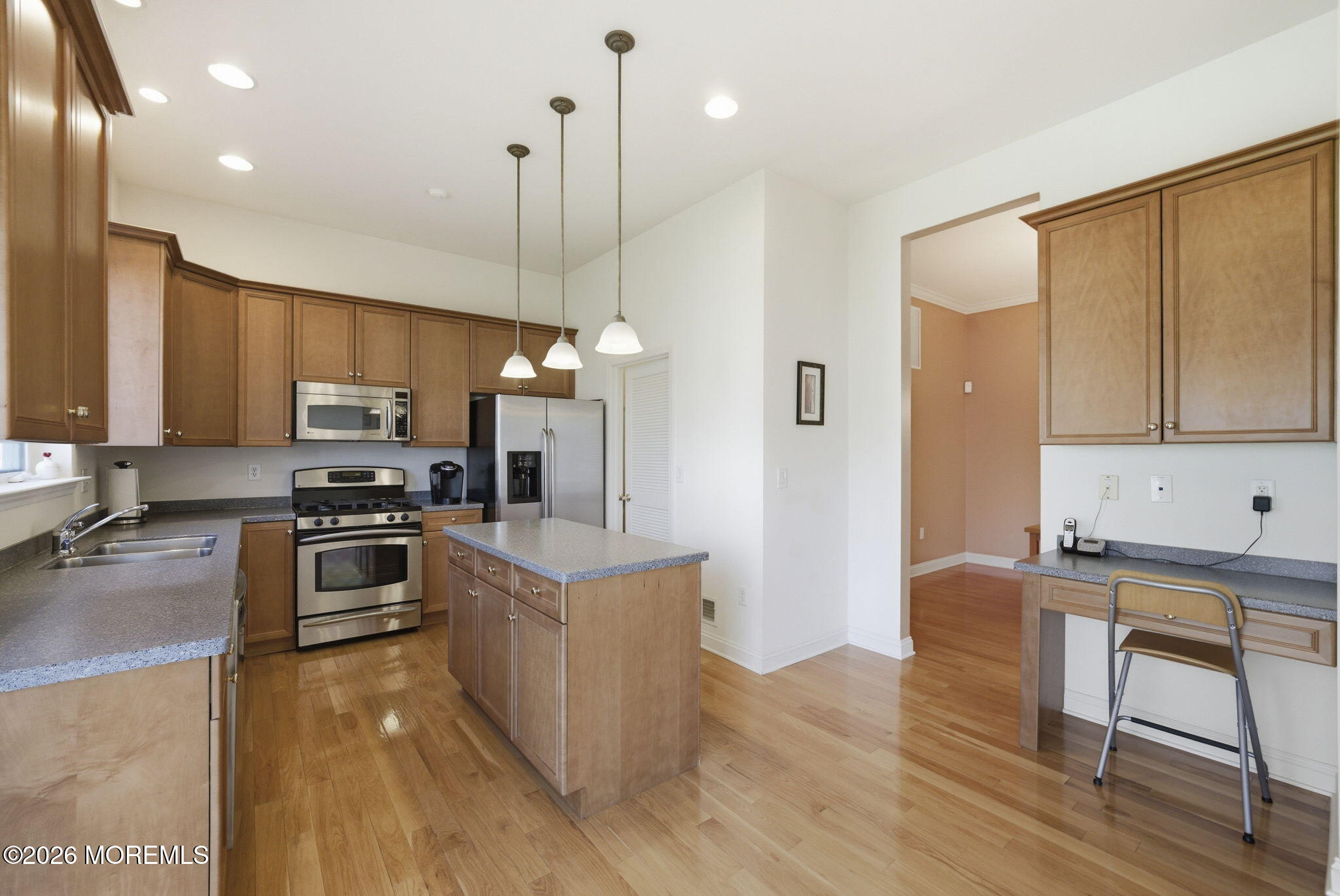 20 Royal Lane Howell, NJ 07731 - Photo 22 of 53 a kitchen with kitchen island a large counter top space appliances and cabinets