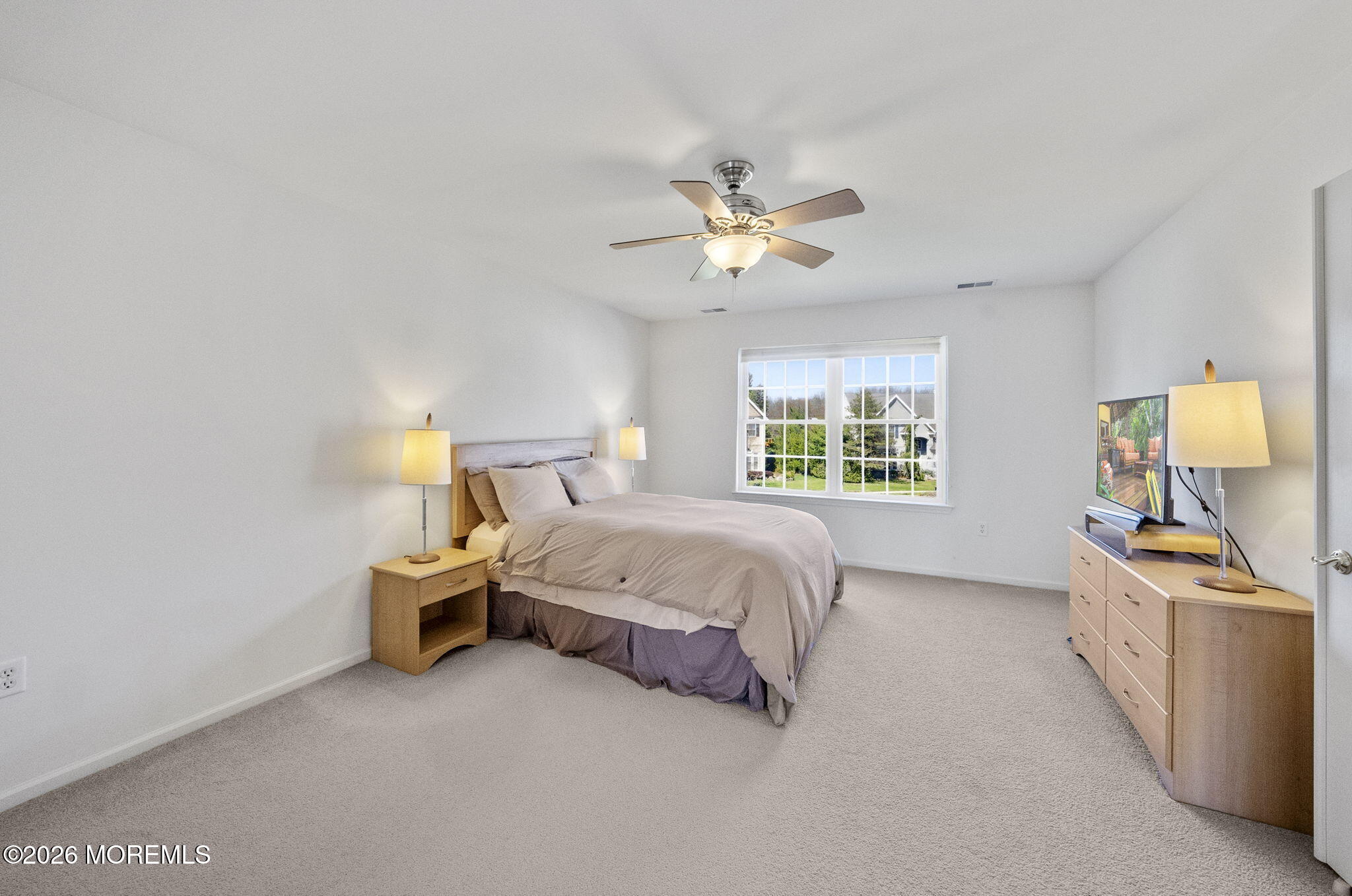 20 Royal Lane Howell, NJ 07731 - Photo 32 of 53 a spacious bedroom with a bed and a window