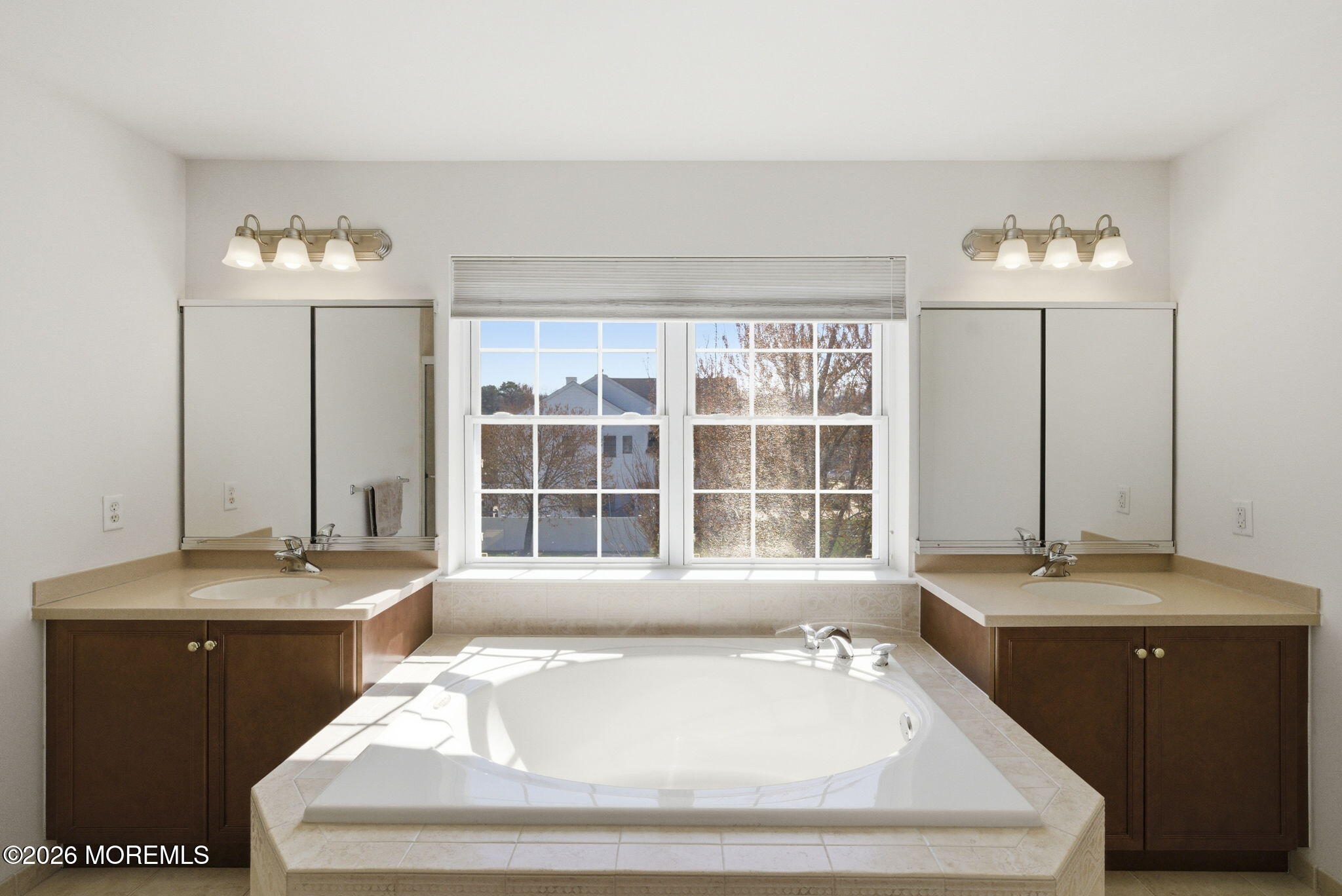 20 Royal Lane Howell, NJ 07731 - Photo 33 of 53 a bathroom with a bathtub sink and a mirror