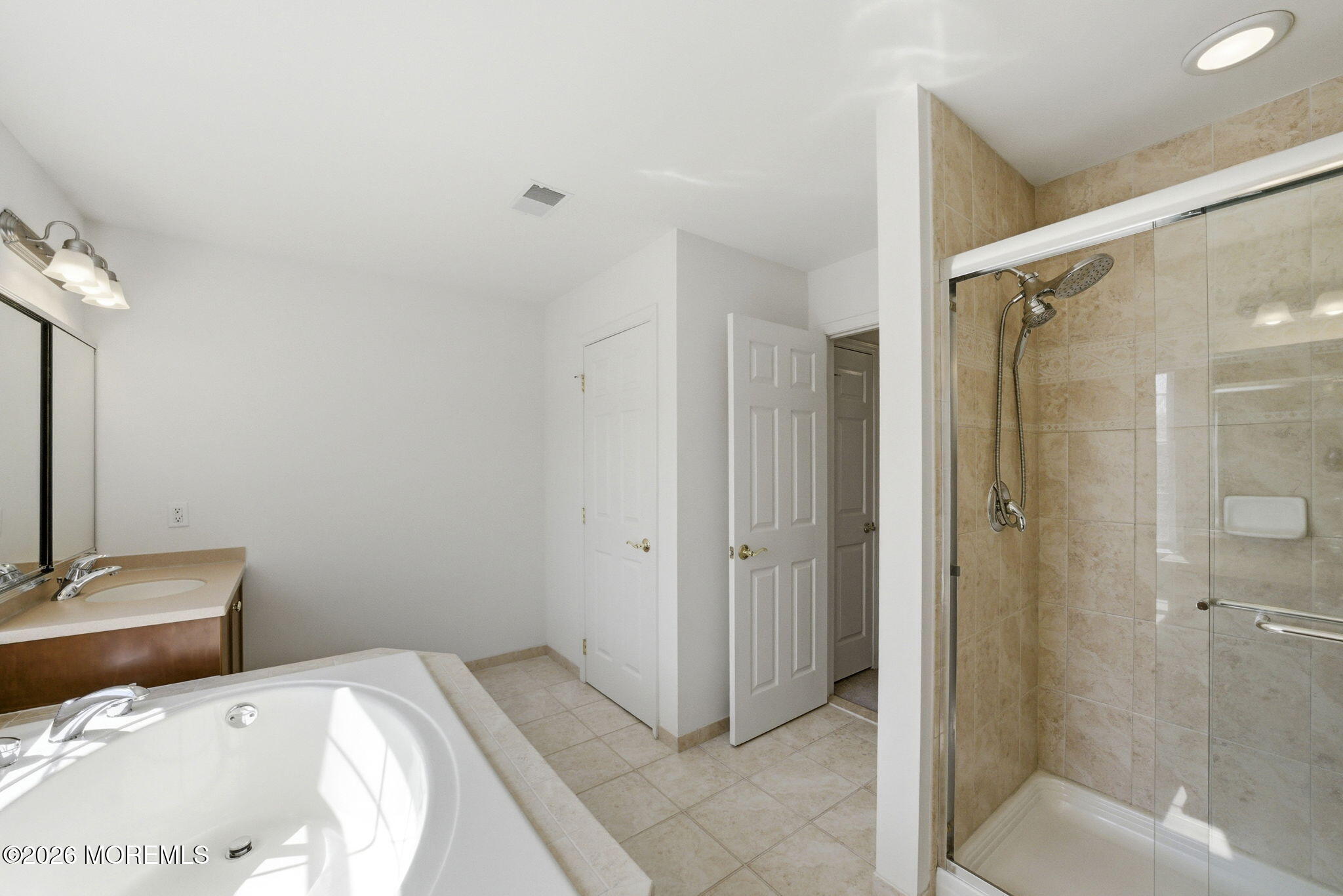 20 Royal Lane Howell, NJ 07731 - Photo 35 of 53 a bathroom with a sink and shower