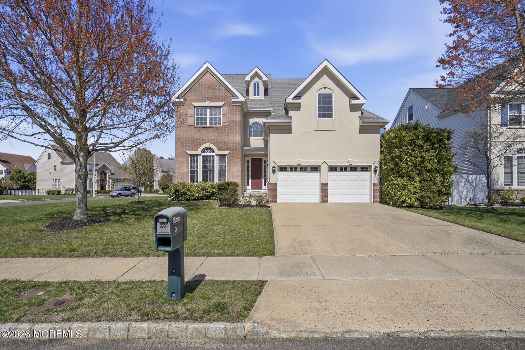 20 Royal Lane Howell, NJ 07731 - Photo 53 of 53 a front view of a house with a yard and garage