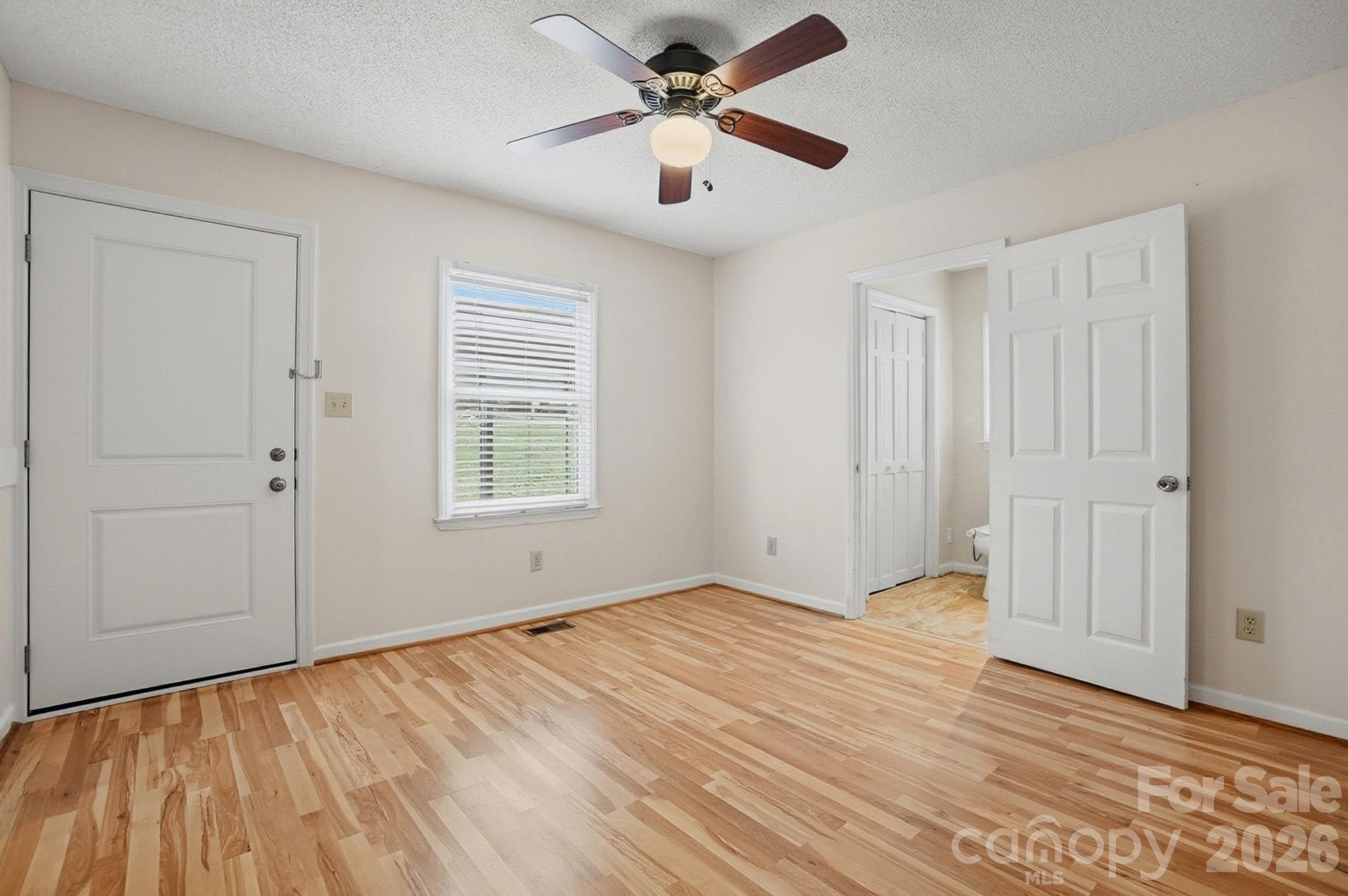 616 Durham Road Stanley, NC 28164 - Photo 16 of 42 a view of an empty room with a window