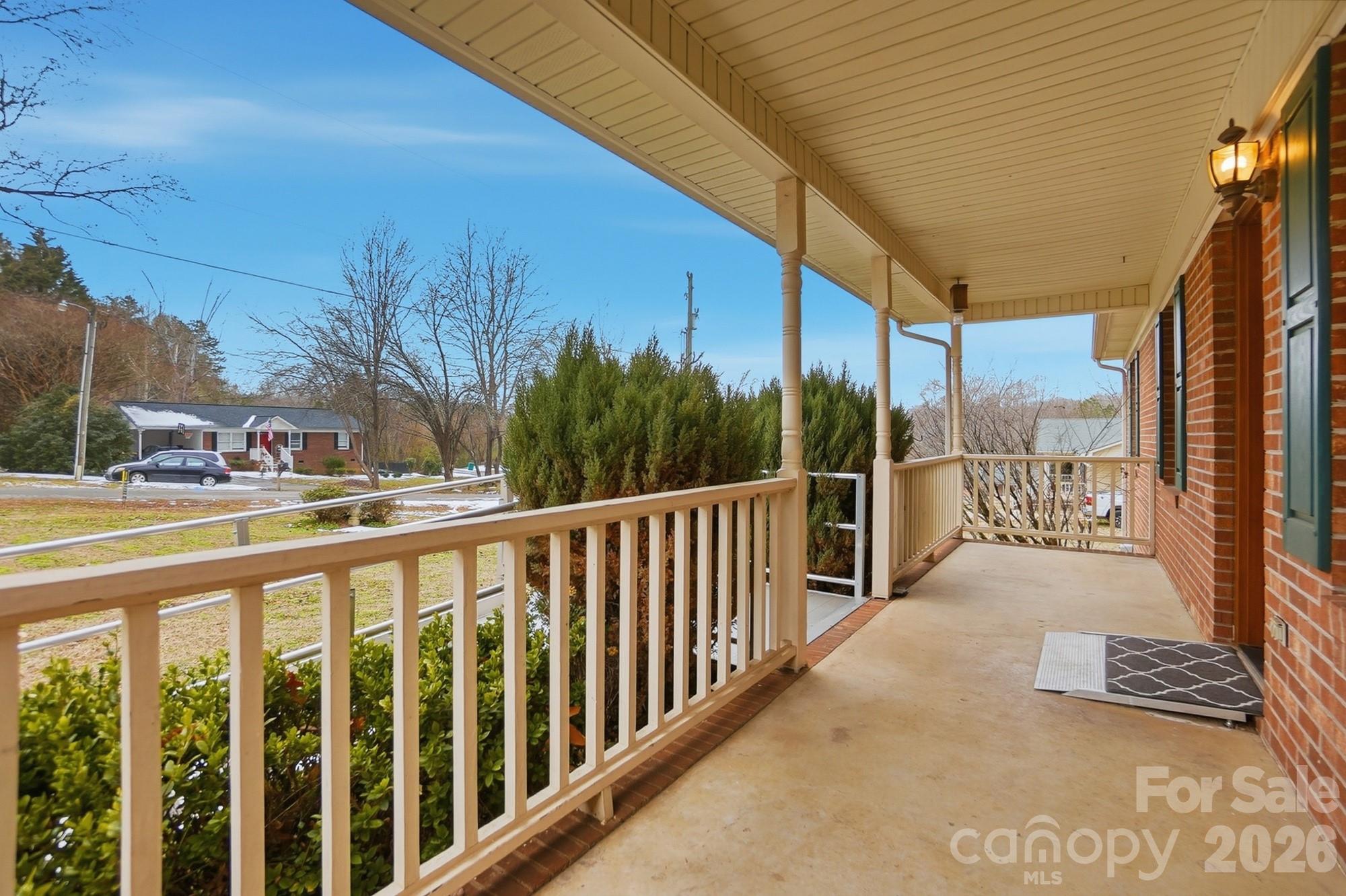 616 Durham Road Stanley, NC 28164 - Photo 2 of 42 a view of a street with a balcony