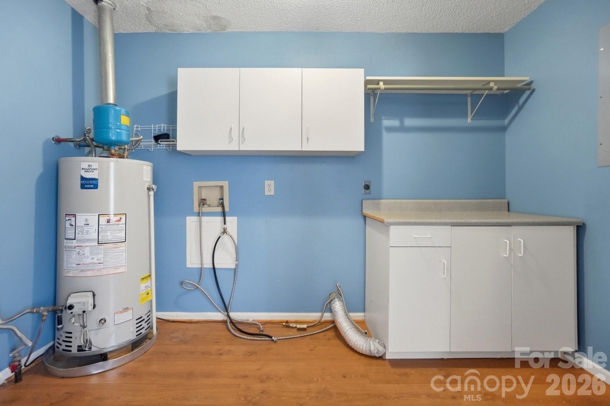 616 Durham Road Stanley, NC 28164 - Photo 22 of 42 a view of kitchen with washer and dryer