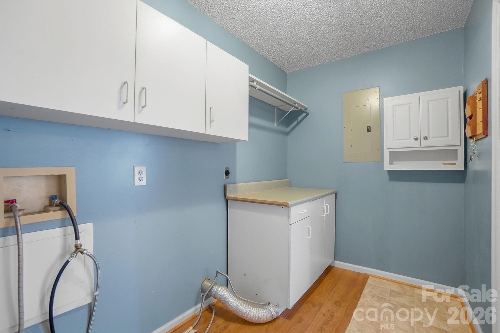 616 Durham Road Stanley, NC 28164 - Photo 23 of 42 a storage room with cabinets