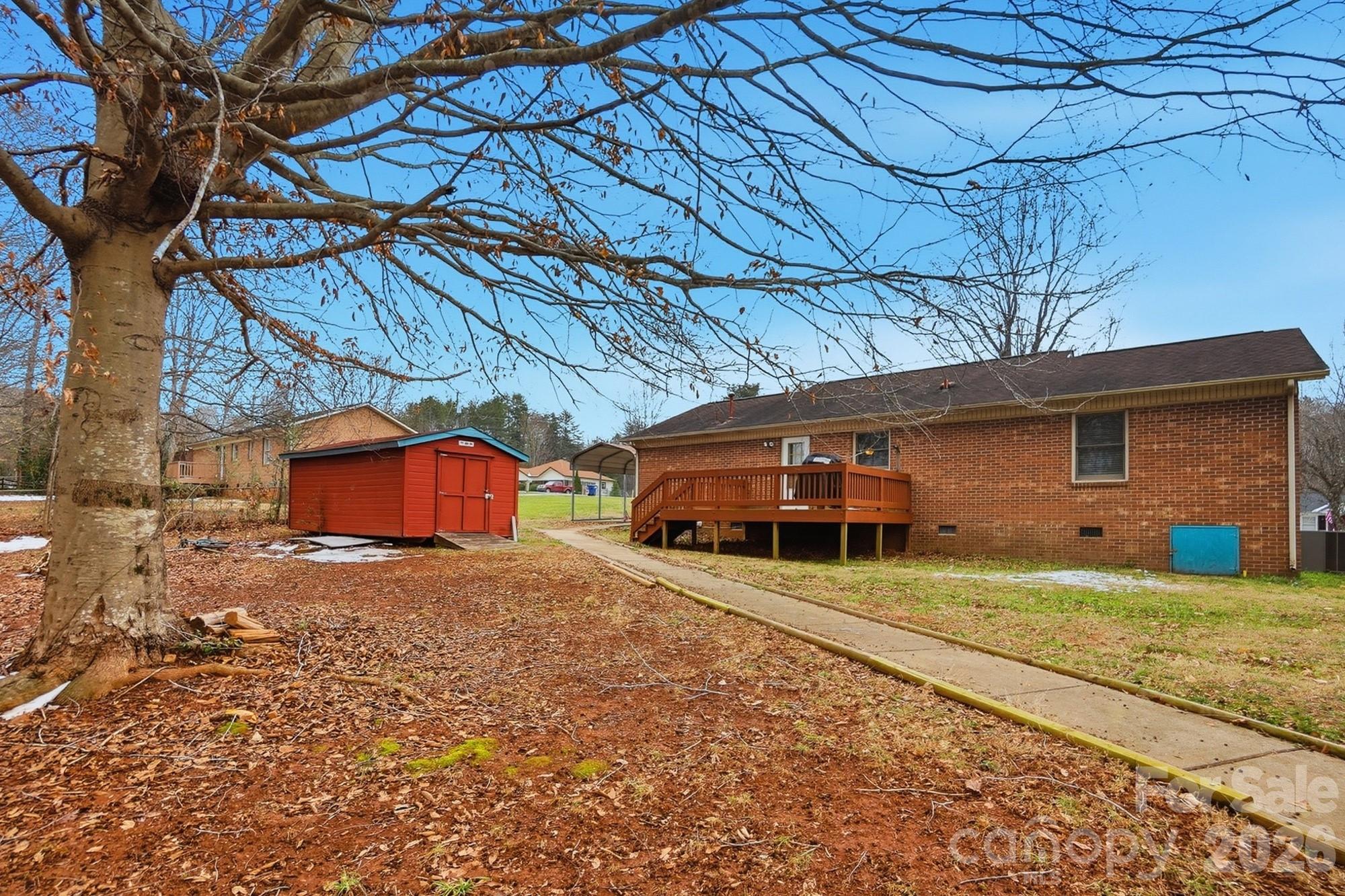 616 Durham Road Stanley, NC 28164 - Photo 37 of 42 a view of a house with a yard