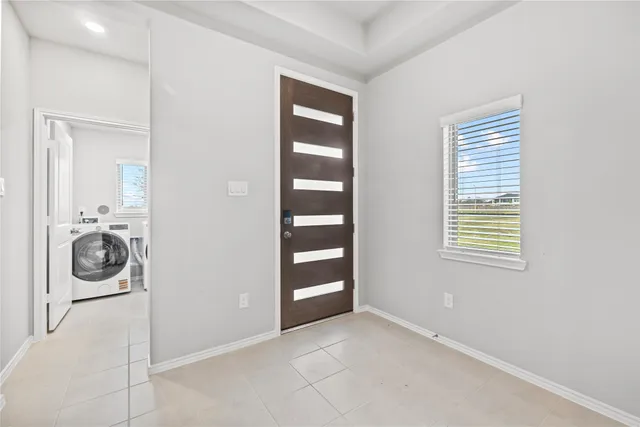 a view of a storage & utility room washer and dryer