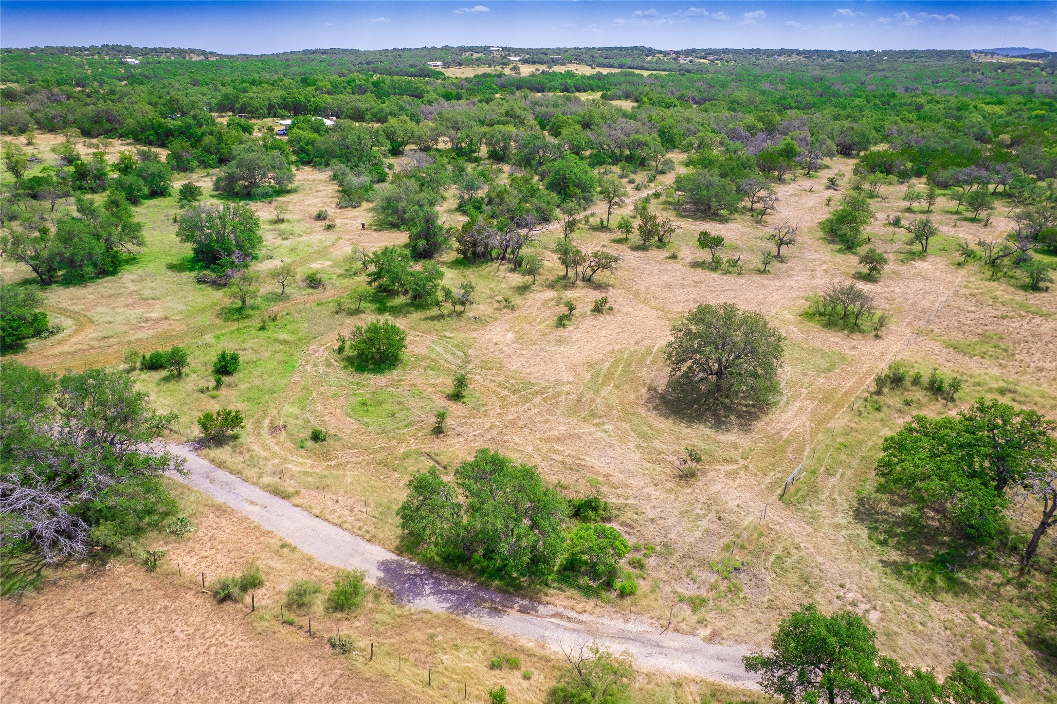 Tbd Winnie Smith Road Round Mountain, TX 78663 - Photo 5 of 30 a view of a yard with a lake
