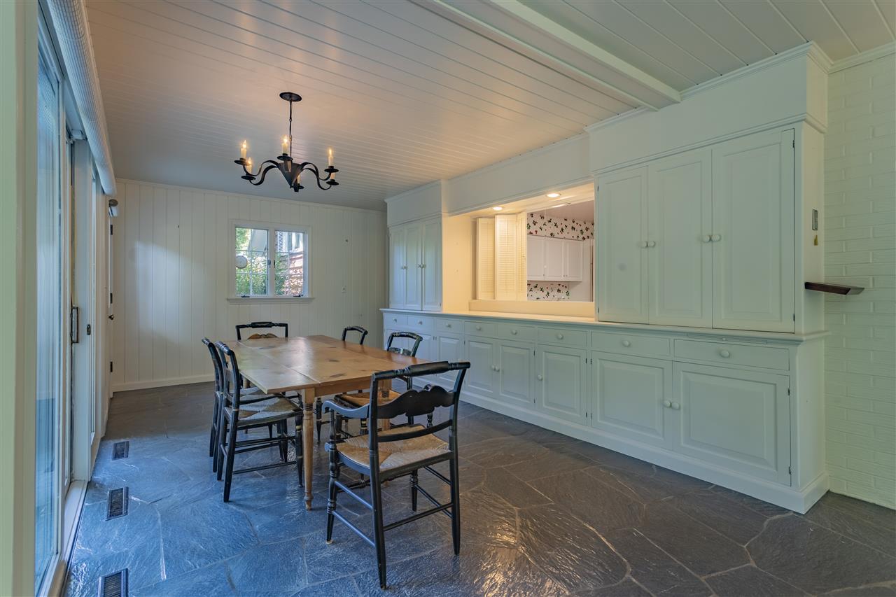 3307 Landstrom Road Rockford, IL 61107 - Photo 12 of 40 a view of a dining room with furniture and chandelier