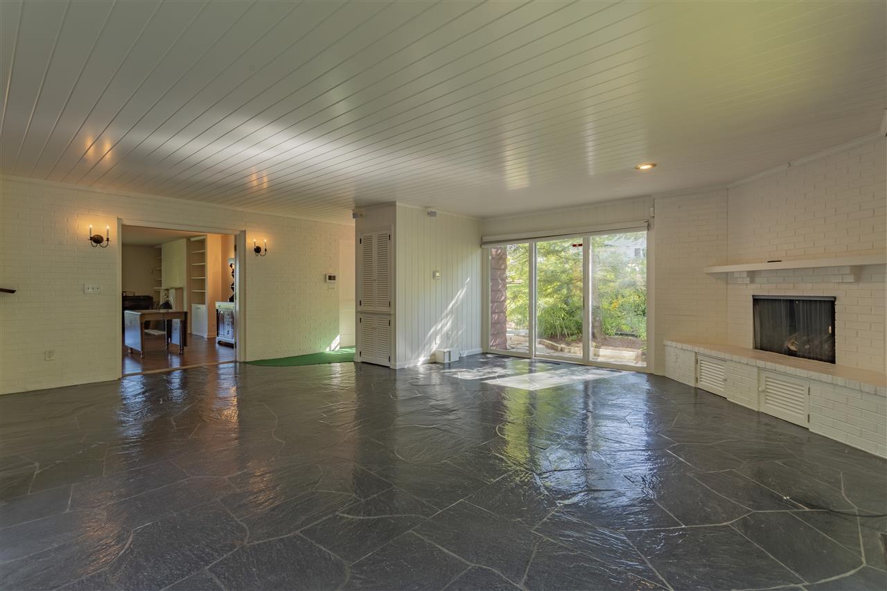 3307 Landstrom Road Rockford, IL 61107 - Photo 14 of 40 a view of empty room with wooden floor and fireplace
